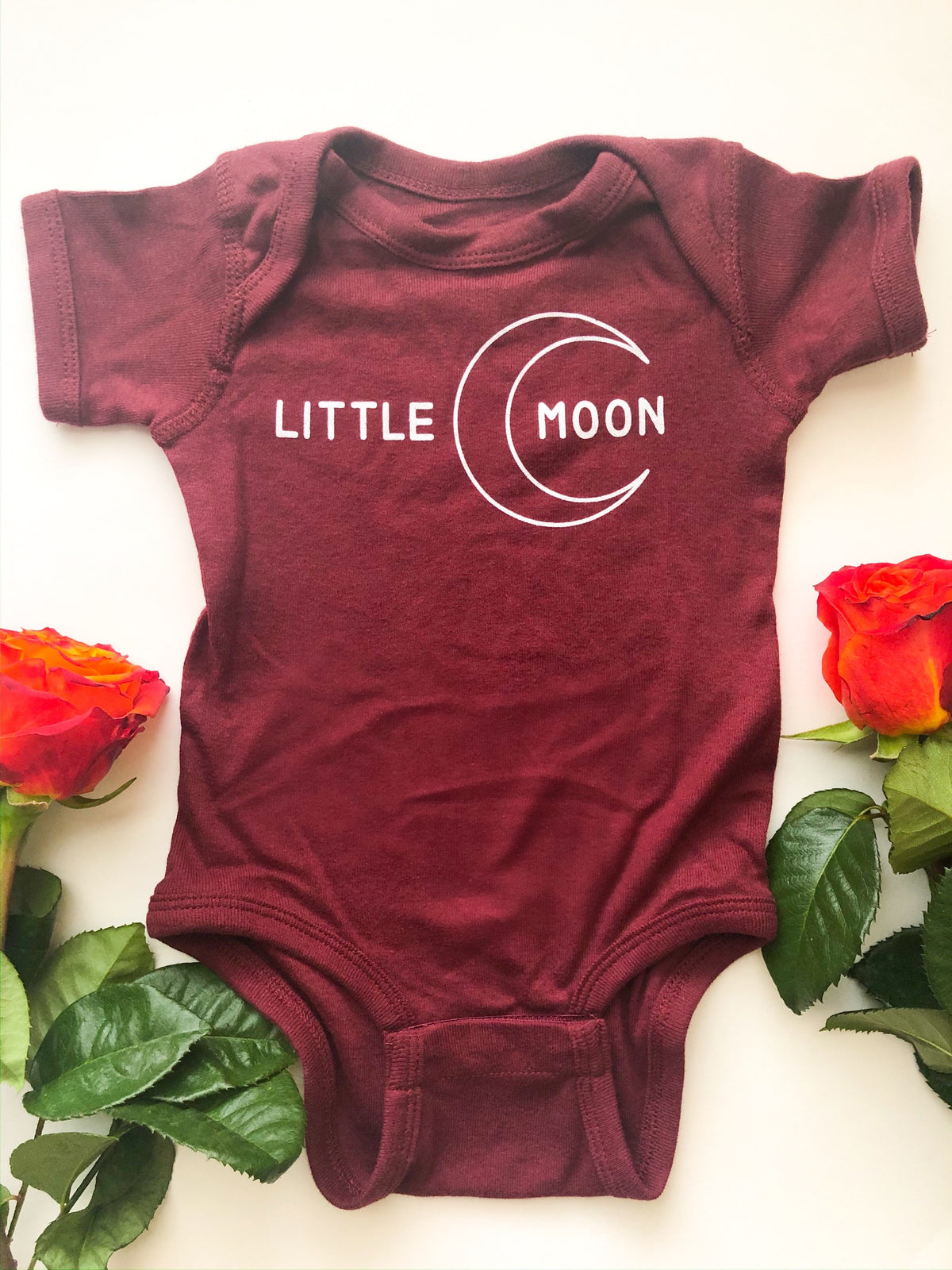 little moon onesie with moon graphic