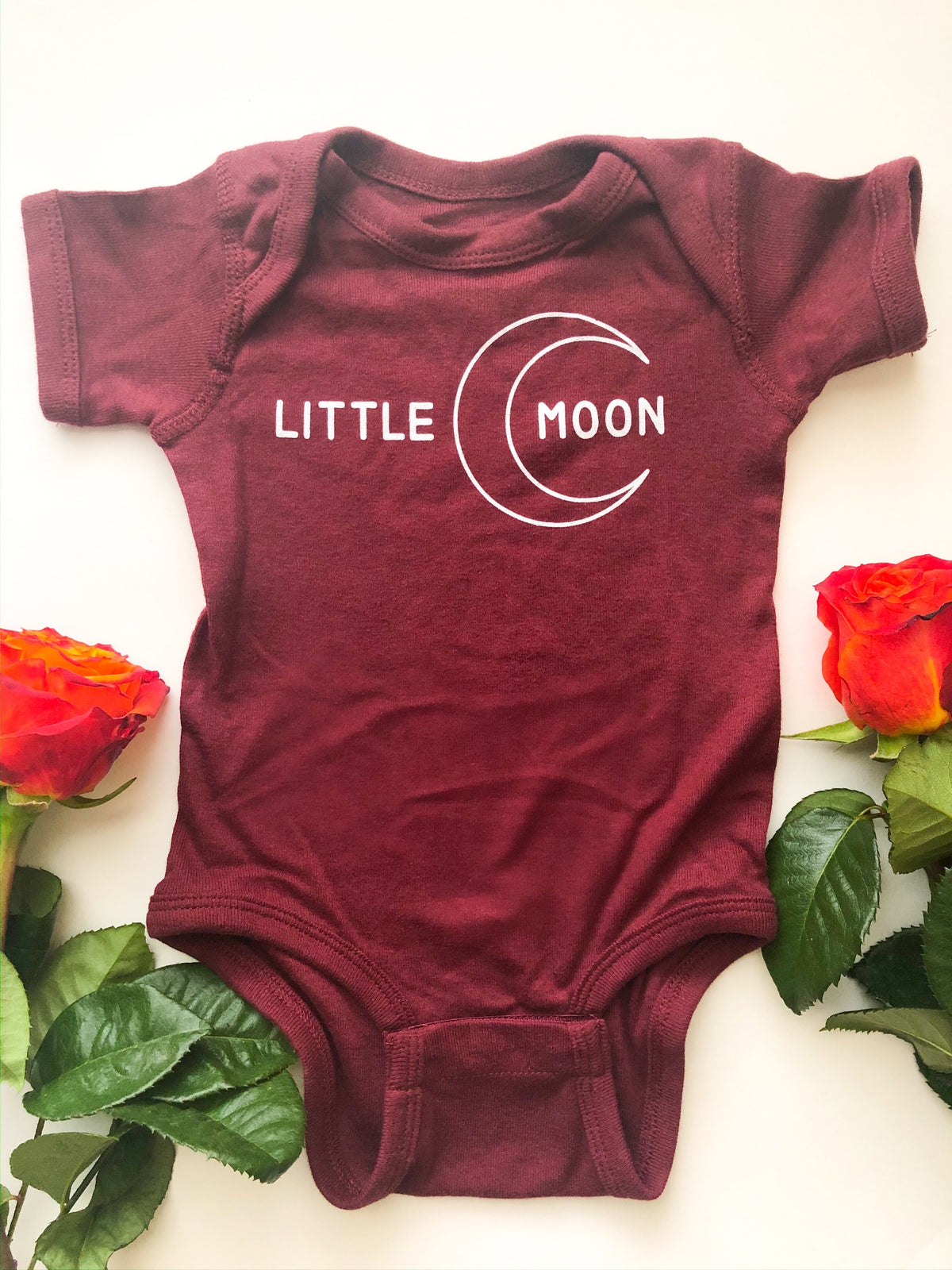 little moon onesie with moon graphic