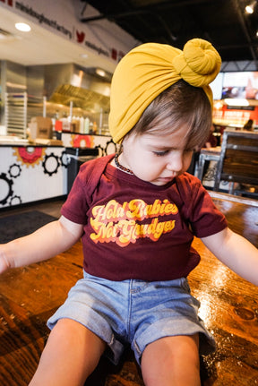 hold babies not grudges kids tee
